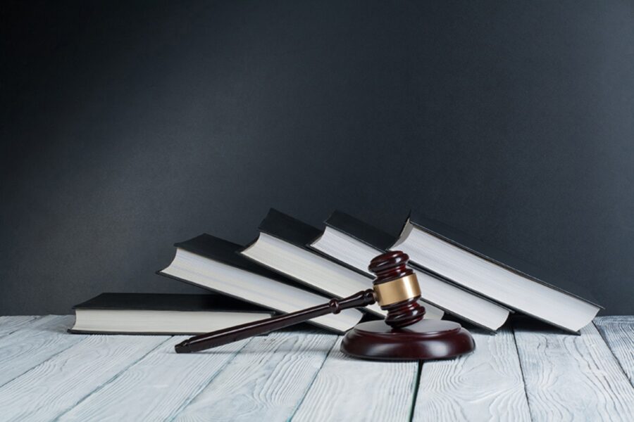 A gavel and some books.
