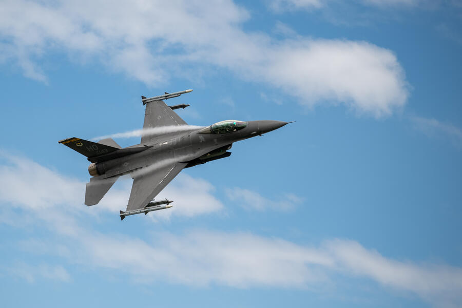 An air force jet in the sky.