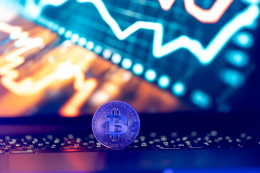 Image showing a bitcoin and financial  graph.