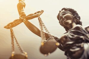 Lady Justice holding scales of justice.