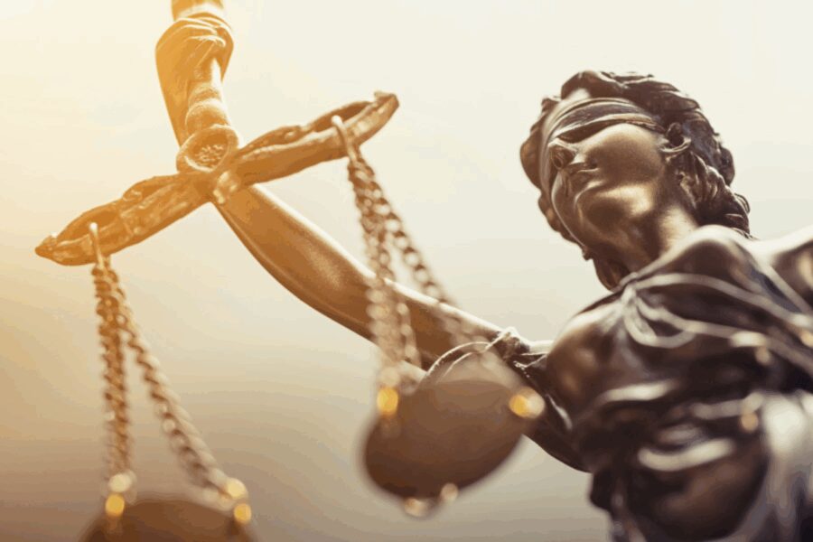 Lady Justice holding scales of justice.