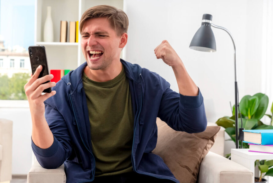 Man celebrating for winning at pakakumi