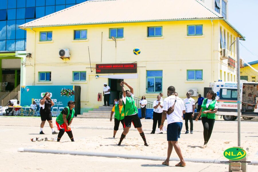 Ghana National Lottery staff compete in volleyball, part of the Customer Service Month sports celebration promoting teamwork and camaraderie.