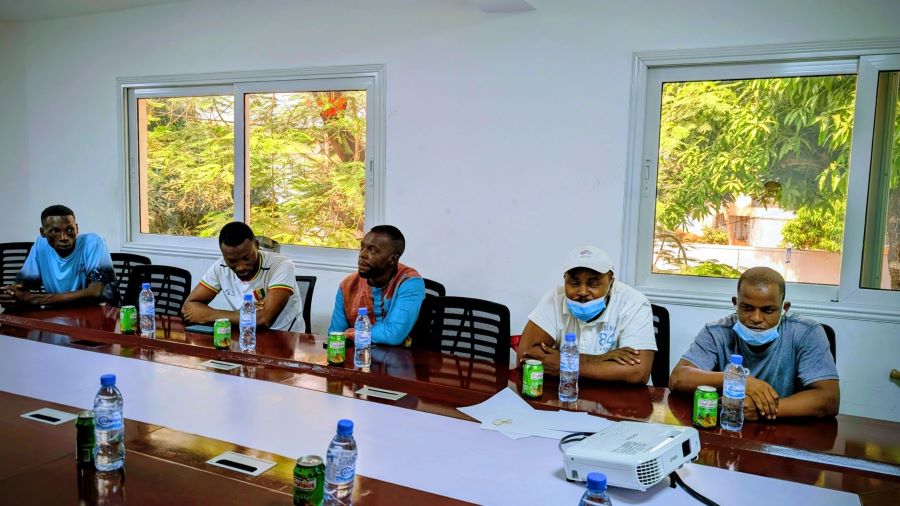 Key stakeholders from The National Lottery of Guinea discuss the prosthetic initiative and plans for beneficiary support during a project meeting.