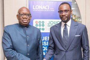 LONACI Director General Dramane Coulibaly (left) welcomes LNB SA Managing Director Marius Adanzounon 
