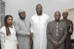 LONASE officials mark the handover at Wootel as Ibrahima Ndiaye takes over as the subsidiary’s new director general. 