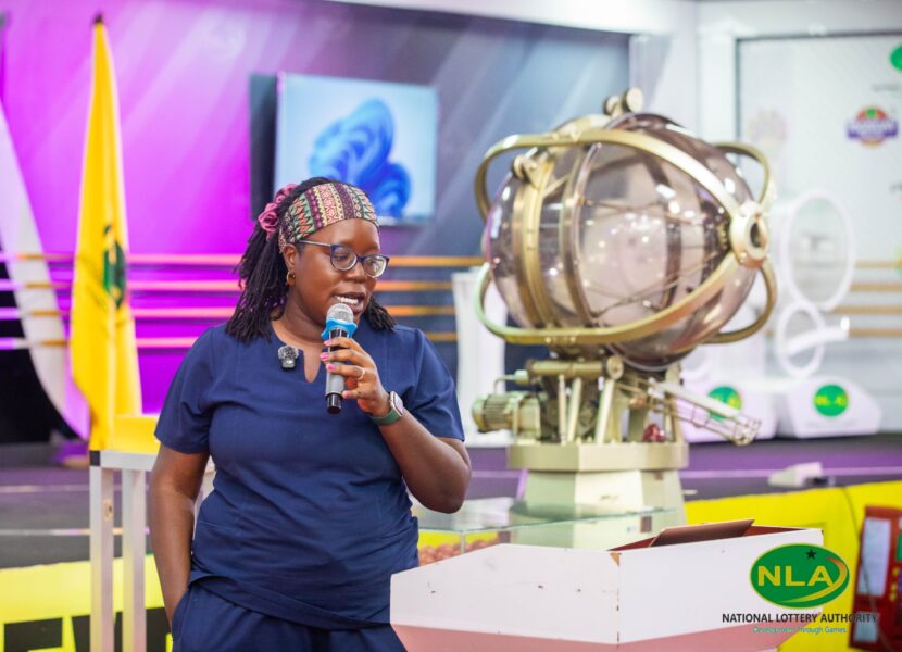 A speaker addresses NLA staff members during Customer Service Week celebrations. 