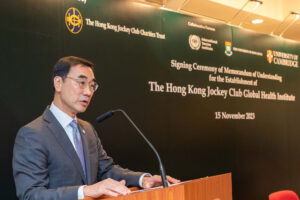 HKJC chairman Michael Lee delivers a speech at the Memorandum of Understanding signing ceremony.