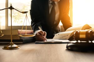 Man signing a legal order.