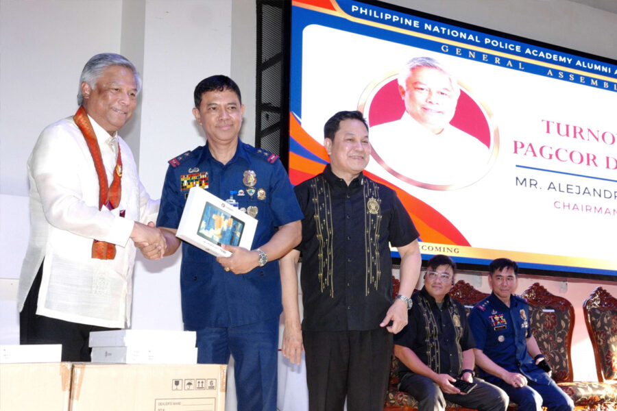 Maj. Gen Christopher Birung (2nd from left) and PAOCC Executive Director and PNPAAAI Chairman Undersecretary Gilbert Cruz (3rd from left) receive from PAGCOR Chairman and CEO Alejandro H. Tengco the 100 tablets to help in the learning needs of PNPA cadets.