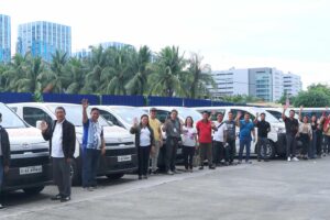 Representatives from the eight recipient LGUs pose with the Patient Transport Vehicles donated by PAGCOR at the gaming agency’s Corporate Office in Pasay City on June 10. Photo: PAGCOR.