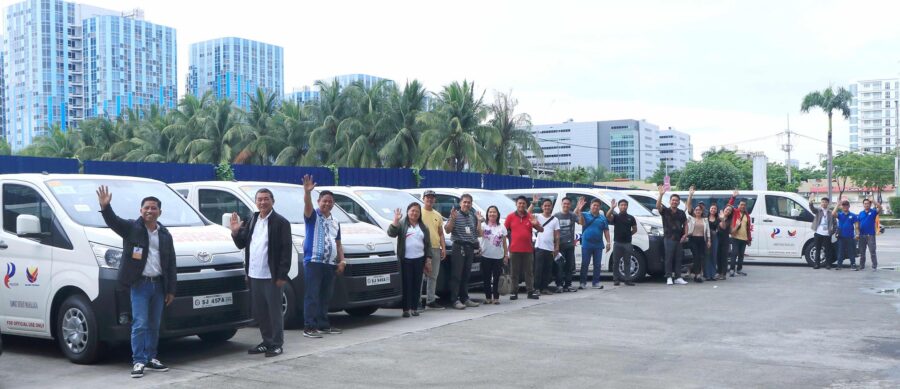 Representatives from the eight recipient LGUs pose with the Patient Transport Vehicles donated by PAGCOR at the gaming agency’s Corporate Office in Pasay City on June 10. Photo: PAGCOR.