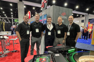 Goran Sovilj, Global Sales Director (third from left), with Mark Larson, CEO of Dynamic Gaming (fourth from left), and the rest of the Dynamic Gaming team.