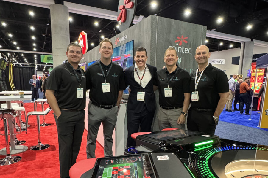 Goran Sovilj, Global Sales Director (third from left), with Mark Larson, CEO of Dynamic Gaming (fourth from left), and the rest of the Dynamic Gaming team.