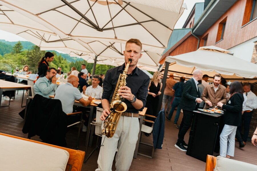 Photo of a man playing the saxophone.