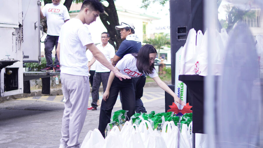Photo of people organising bags.