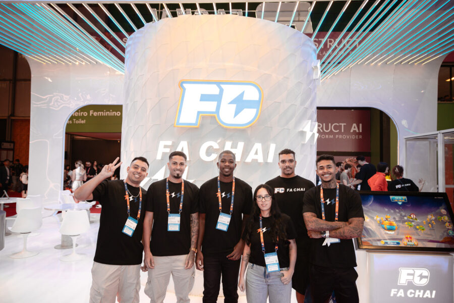 Streamers at FA CHAI GAMING's booth at SBC Summit Rio 2026.