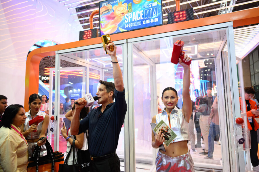 People at FA CHAI GAMING's booth at SBC Summit Rio 2026.