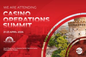 A promotional graphic announcing EGT's attendance at the Casino Operations Summit from 21-23 April 2026 in Thessaloniki, Greece. The design features a bold red background and a circular image showing the White Tower of Thessaloniki. Included are the event details for the Hyatt Regency Conference Centre and logos for both EGT and the summit.