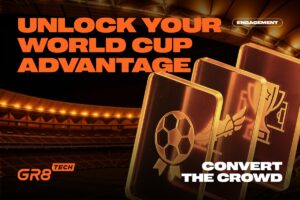 A promotional graphic for GR8 Tech with the headline ‘UNLOCK YOUR WORLD CUP ADVANTAGE’ in bold orange text. The image features three translucent, glowing bronze cards in the foreground displaying icons of a football, a winged boot, and a trophy. The background shows a blurred, lit football stadium at night, with the subtext ‘CONVERT THE CROWD’ in the bottom-right corner and the GR8 Tech logo in the bottom-left.