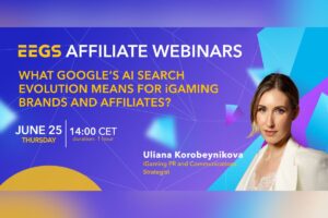 A promotional webinar banner. On the right, a colour portrait shows Uliana Korobeynikova. On the left, the main event title reads ‘EEGS AFFILIATE WEBINARS’. Beneath it, the webinar topic is written in large yellow capital letters: ‘WHAT GOOGLE’S AI SEARCH EVOLUTION MEANS FOR iGAMING BRANDS AND AFFILIATES?’. The event details appear in the lower left in white and yellow: ‘JUNE 25 THURSDAY | 14:00 CET duration: 1 hour’. Towards the bottom centre, the speaker's details are written in white and yellow text: ‘Uliana Korobeynikova, iGaming PR and Communications Strategist’.