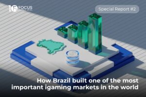 A promotional industry graphic from Focus Gaming News featuring an isometric, 3D digital illustration. In front of it sits a small, cylindrical white stack with glowing blue layers. Behind these elements, four translucent teal blocks rise in sequence to form a growing bar chart, with a subtle upward-pointing arrow visible inside the tallest column. The white Focus Gaming News logo is in the top-left corner, and a pill-shaped button in the top-right reads ‘Special Report #2’. Across the bottom, the main headline reads: ‘How Brazil built one of the most important igaming markets in the world’.